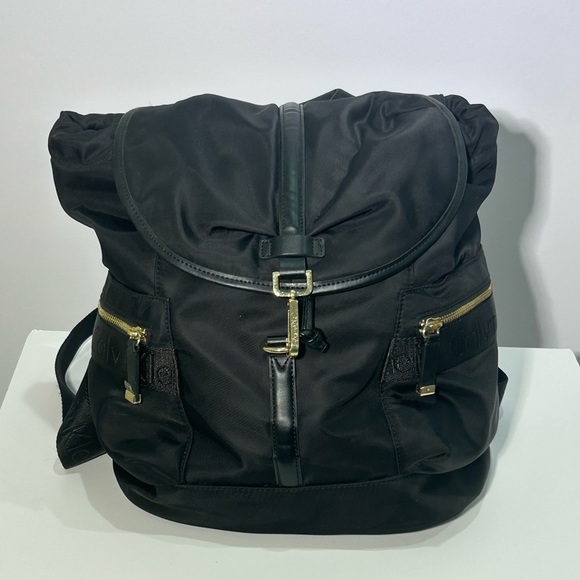 Calvin Klein black backpack with gold hardware - Picture 1 of 7